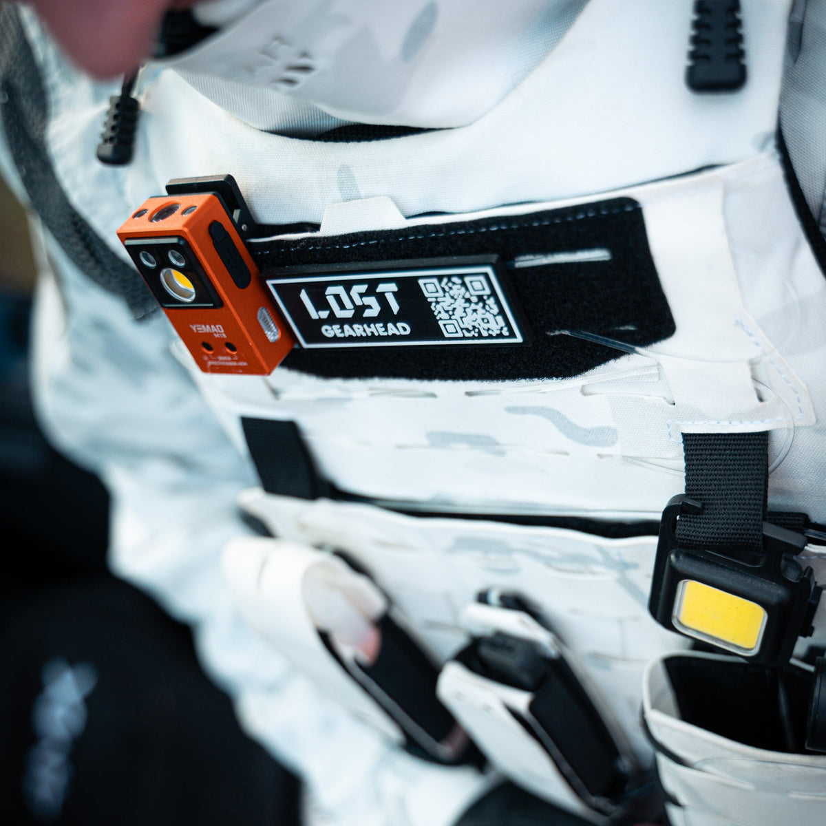 Custom LOSTGEAR name patch attached to tactical gear